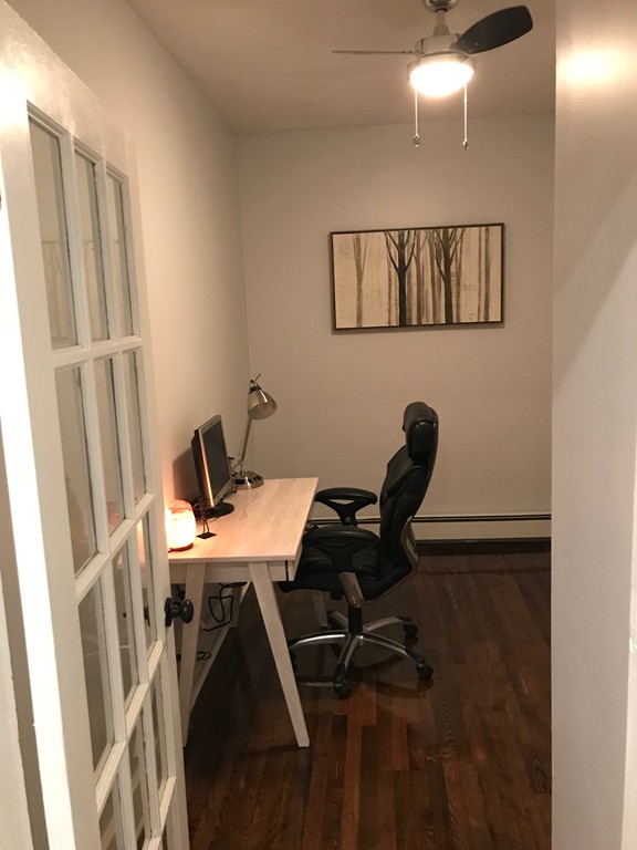 18 Park Street Boston, MA 02136 - Photo 9 of 20 a view of a workspace with furniture and bathroom