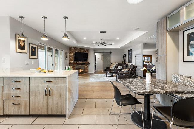 2549 Morley Way Sacramento, CA 95864 - Photo 19 of 44 a large kitchen with kitchen island a sink table and chairs