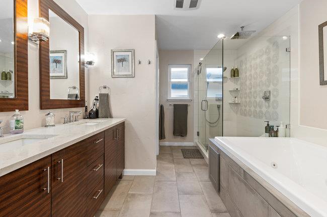 2549 Morley Way Sacramento, CA 95864 - Photo 24 of 44 a spacious bathroom with a granite countertop sink mirror and shower