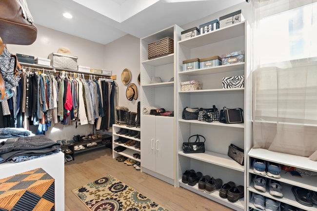 2549 Morley Way Sacramento, CA 95864 - Photo 28 of 44 a view of walk in closet with clothes and shoes
