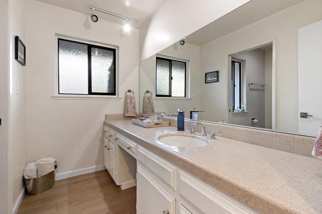 2549 Morley Way Sacramento, CA 95864 - Photo 31 of 44 a bathroom with a double vanity sink and a mirror