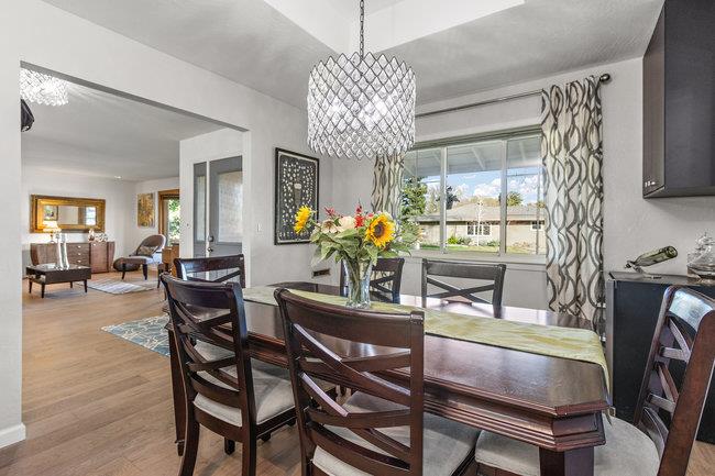 2549 Morley Way Sacramento, CA 95864 - Photo 9 of 44 a dining room with furniture a chandelier and wooden floor
