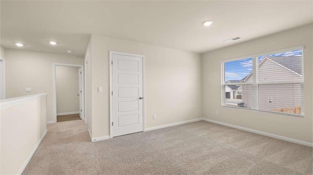 100 Planters Row Perry, GA 31069 - Photo 14 of 37 a view of an empty room with a window