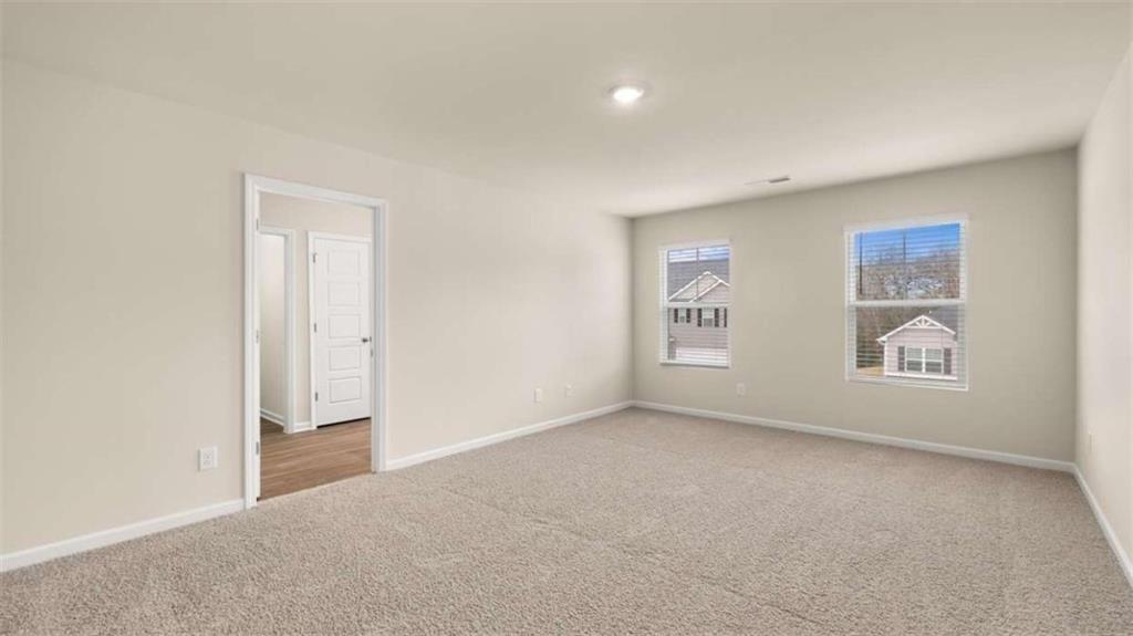 100 Planters Row Perry, GA 31069 - Photo 15 of 37 a view of an empty room with a window
