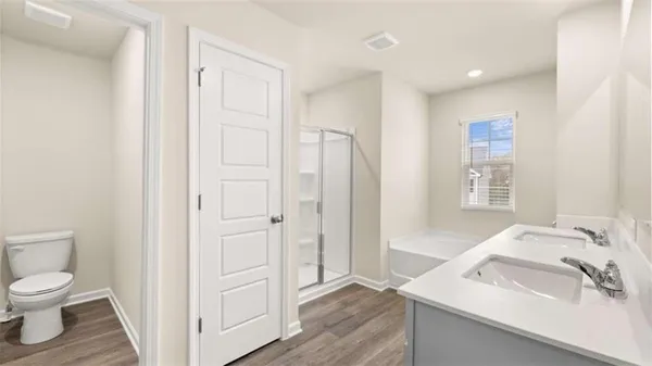 a bathroom with a sink a mirror and a bathtub