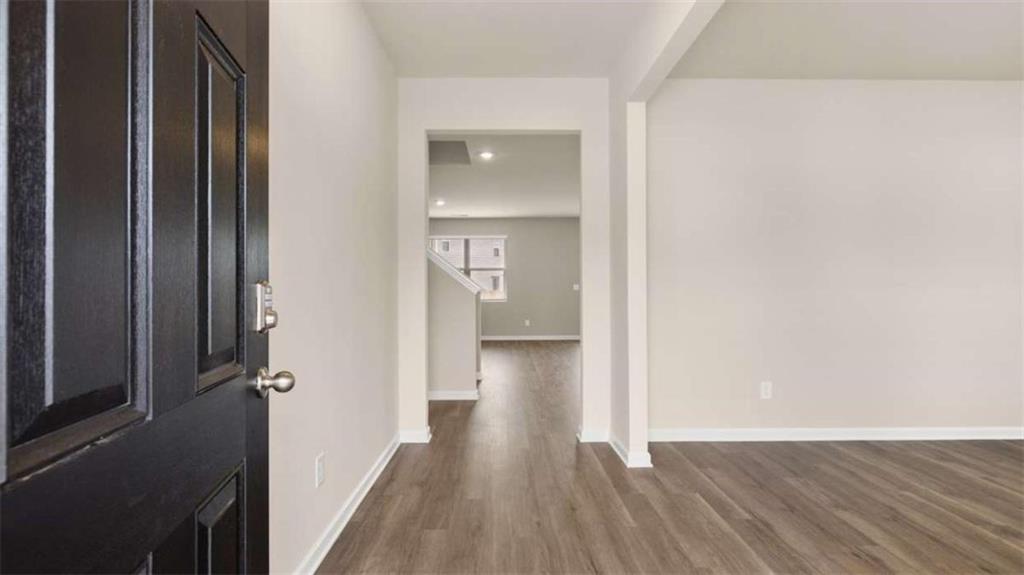 100 Planters Row Perry, GA 31069 - Photo 21 of 37 a view of a hallway with wooden floor