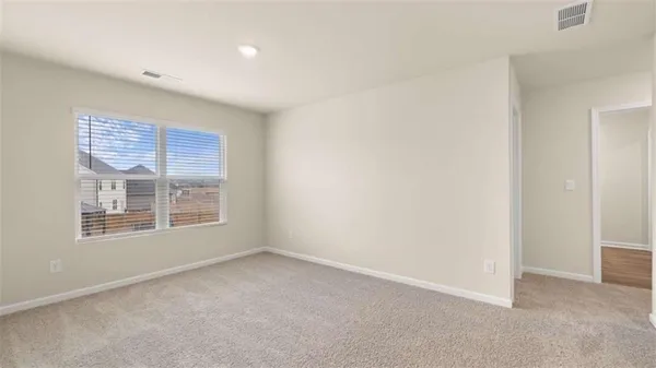 a view of a water fountain in the backyard