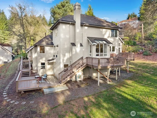 a view of a lake with outdoor space and a lake view