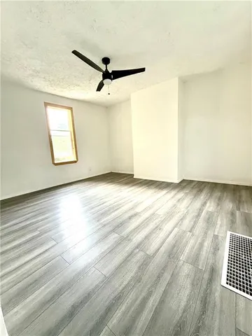 wooden floor in a hall with an entryway