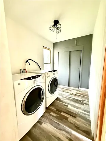 a view of a storage & utility room with washer and dryer
