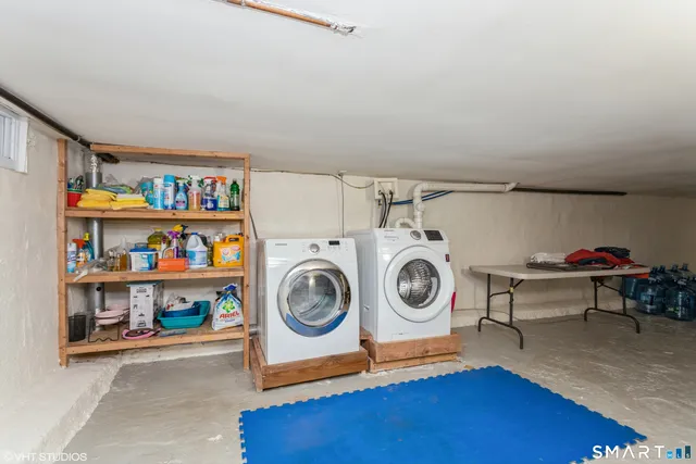 a utility room with dryer and washer