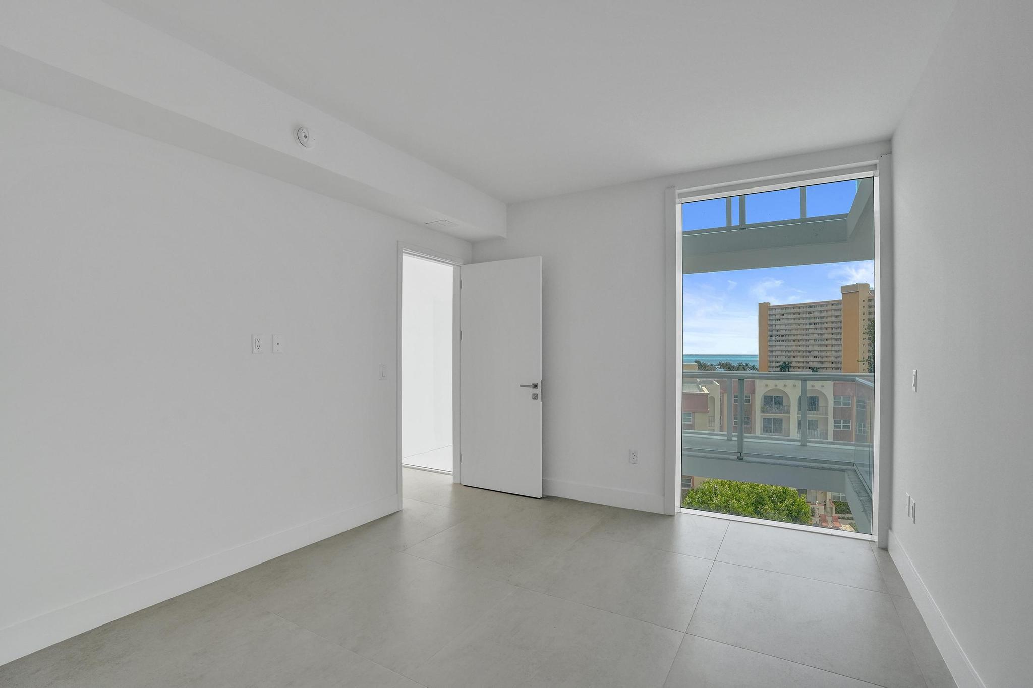 407 North Riverside Drive, Unit 602 Pompano Beach, FL 33062 - Photo 30 of 83 a view of an empty room with a window