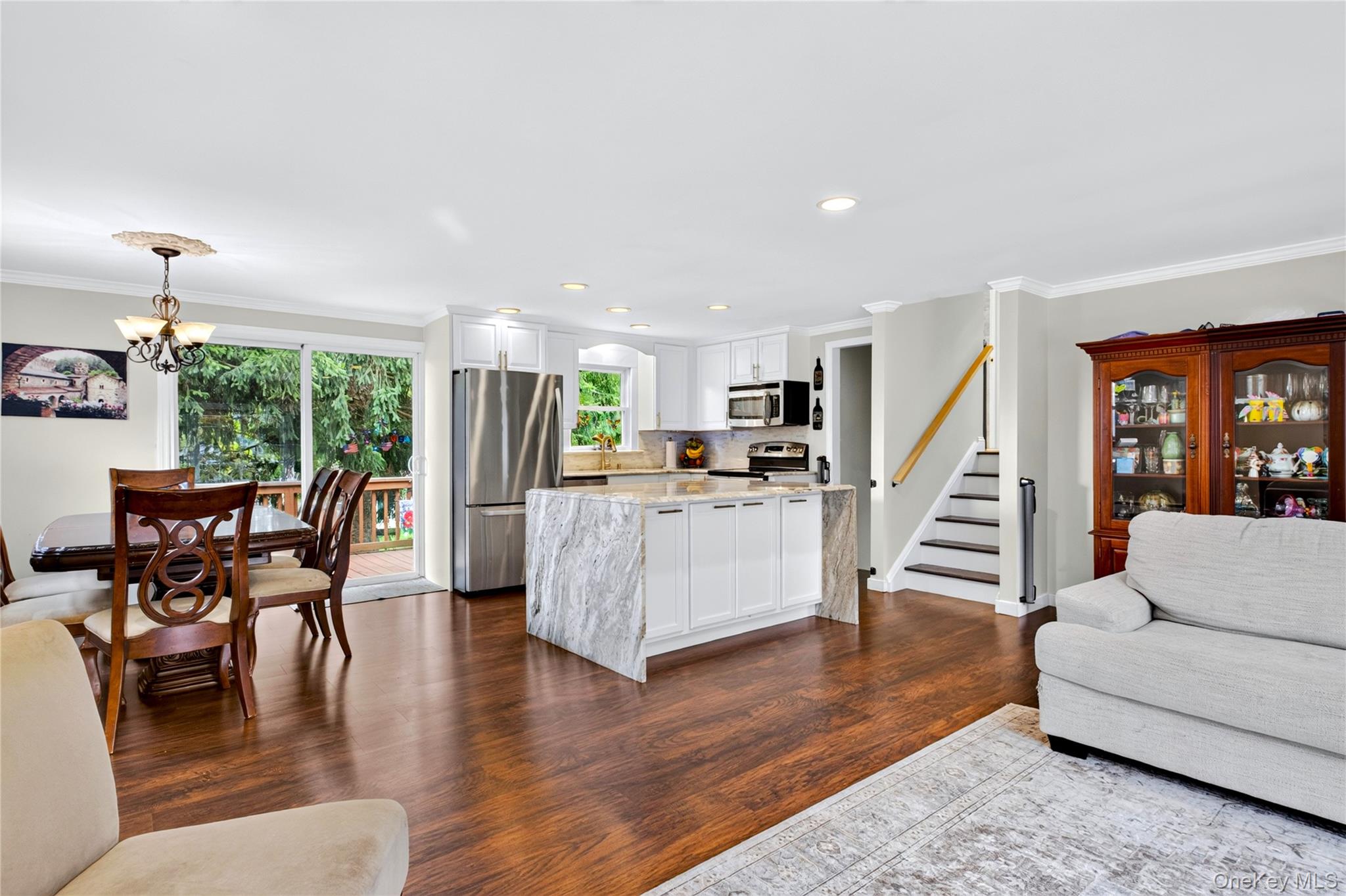 53 Harkin Road Carmel, NY 10512 - Photo 22 of 22 Open floor plan. Dinning room with sliding glass doors to deck.