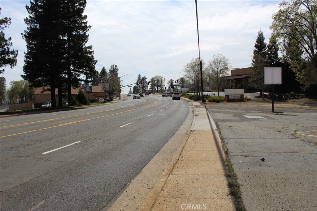 6047 Clark Road Paradise, CA 95969 - Photo 3 of 14 a view of a street with houses on both side
