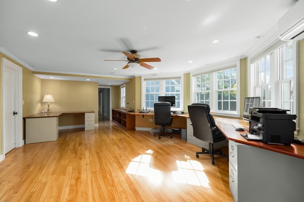 25 Haven Way Beverly, MA 01915 - Photo 15 of 42 a living room with furniture stove and wooden floor