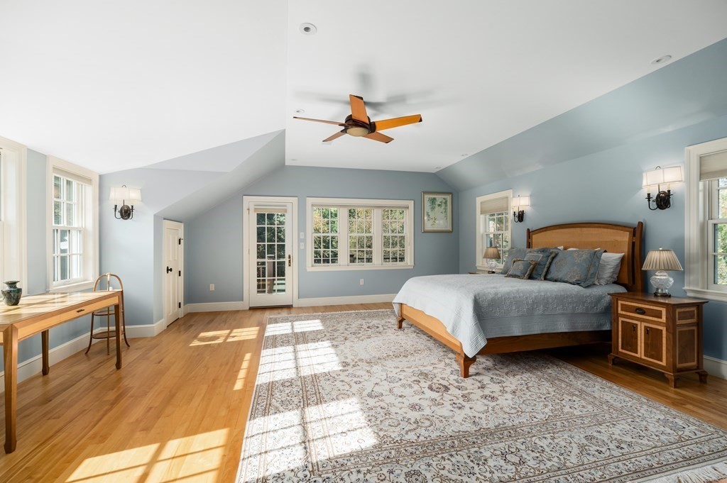 25 Haven Way Beverly, MA 01915 - Photo 16 of 42 a bedroom with a bed and wooden floor