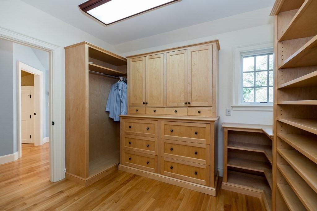25 Haven Way Beverly, MA 01915 - Photo 18 of 42 a view of walk in closet with empty racks