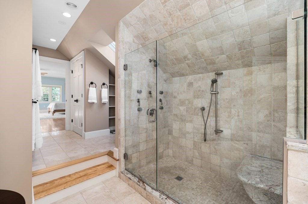 25 Haven Way Beverly, MA 01915 - Photo 20 of 42 a bathroom with a glass shower door