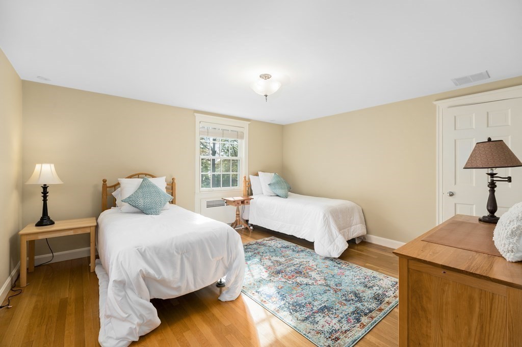 25 Haven Way Beverly, MA 01915 - Photo 21 of 42 a bedroom with a bed and a couch