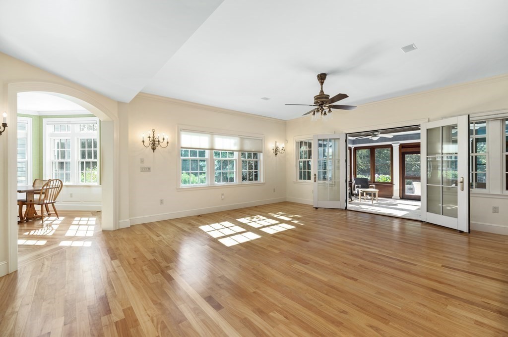 25 Haven Way Beverly, MA 01915 - Photo 32 of 42 a view of an empty room with wooden floor and a window