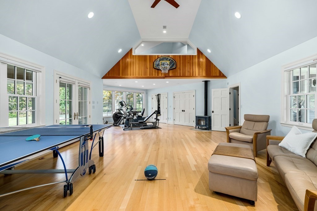 25 Haven Way Beverly, MA 01915 - Photo 37 of 42 a living room with furniture and flat screen tv