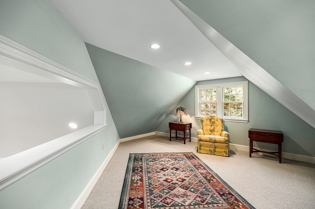 25 Haven Way Beverly, MA 01915 - Photo 39 of 42 a living room with furniture and a rug