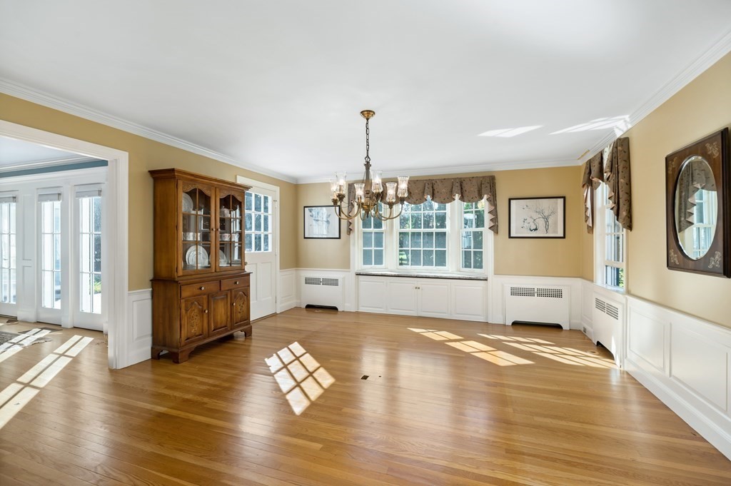 25 Haven Way Beverly, MA 01915 - Photo 10 of 42 a view of an empty room with wooden floor and a window