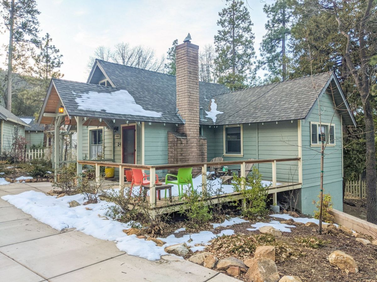 25505 Seneca Road Idyllwild, CA 92549 - Photo 11 of 60 a view of a house with a yard and sitting area