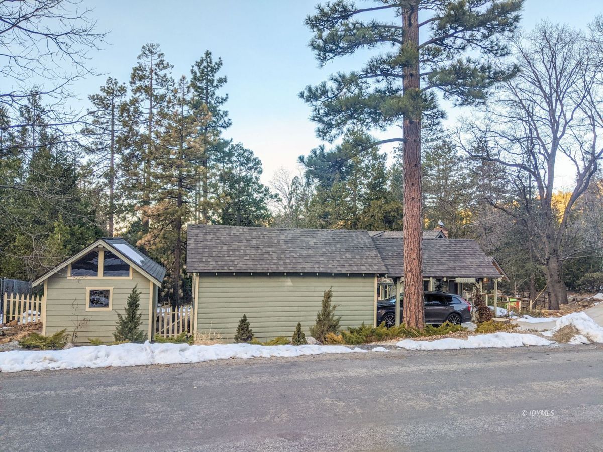 25505 Seneca Road Idyllwild, CA 92549 - Photo 14 of 60 a front view of a house with a yard and garage