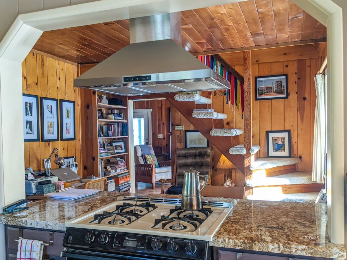 25505 Seneca Road Idyllwild, CA 92549 - Photo 23 of 60 a stove top oven sitting inside of a kitchen