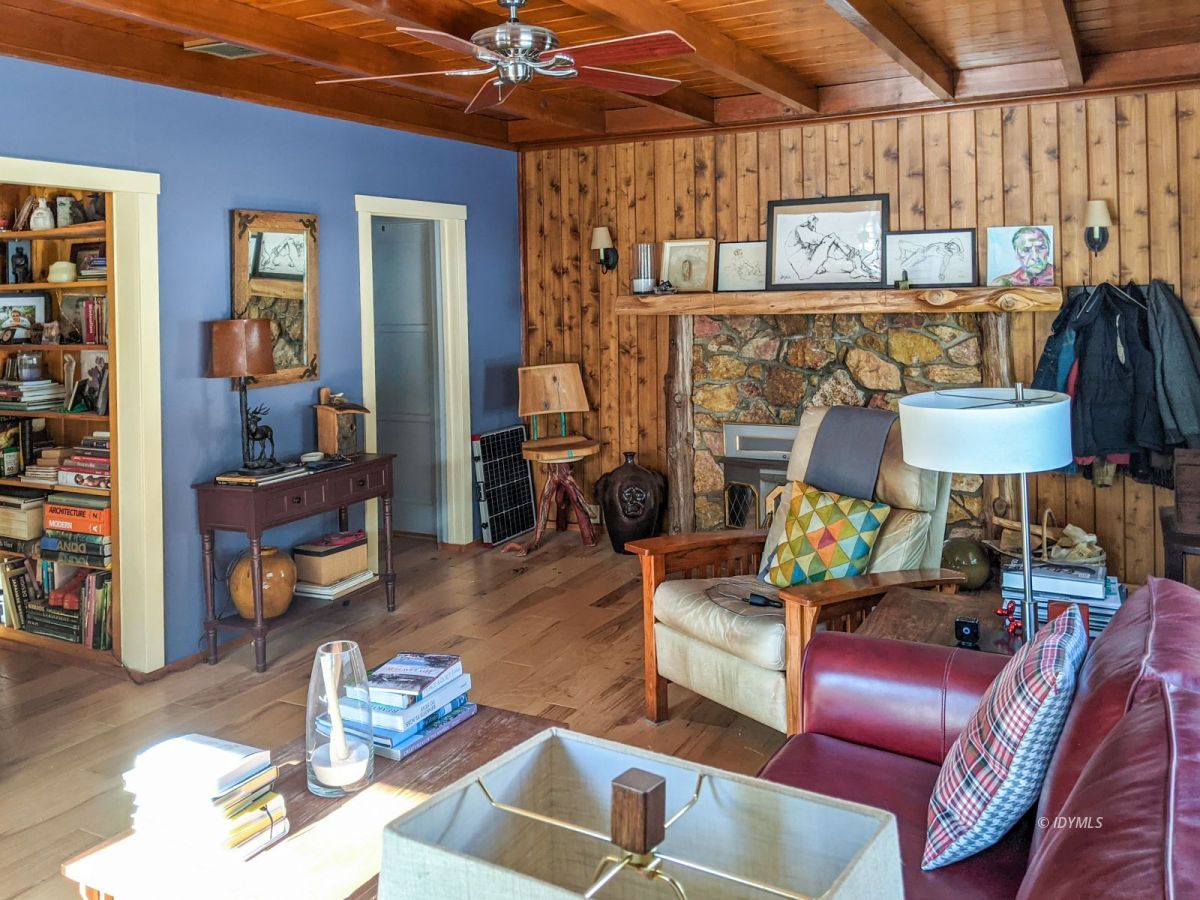 25505 Seneca Road Idyllwild, CA 92549 - Photo 34 of 60 a living room with furniture and wooden floor
