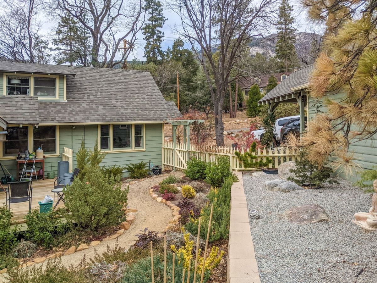 25505 Seneca Road Idyllwild, CA 92549 - Photo 40 of 60 a front view of a house with a yard and porch