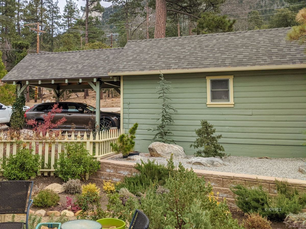 25505 Seneca Road Idyllwild, CA 92549 - Photo 44 of 60 a aerial view of a house with a yard and outdoor seating