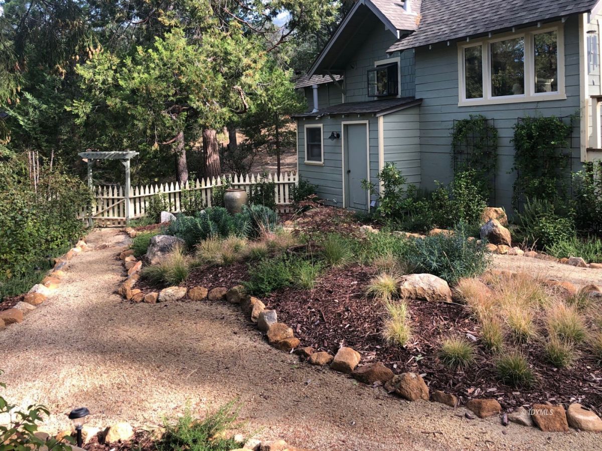 25505 Seneca Road Idyllwild, CA 92549 - Photo 52 of 60 a backyard of a house with lots of green space