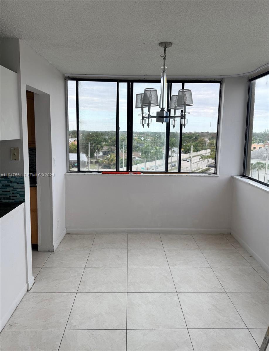 4200 Inverrary Boulevard, Unit 3604 Lauderhill, FL 33319 - Photo 5 of 14 a view of an empty room with a window