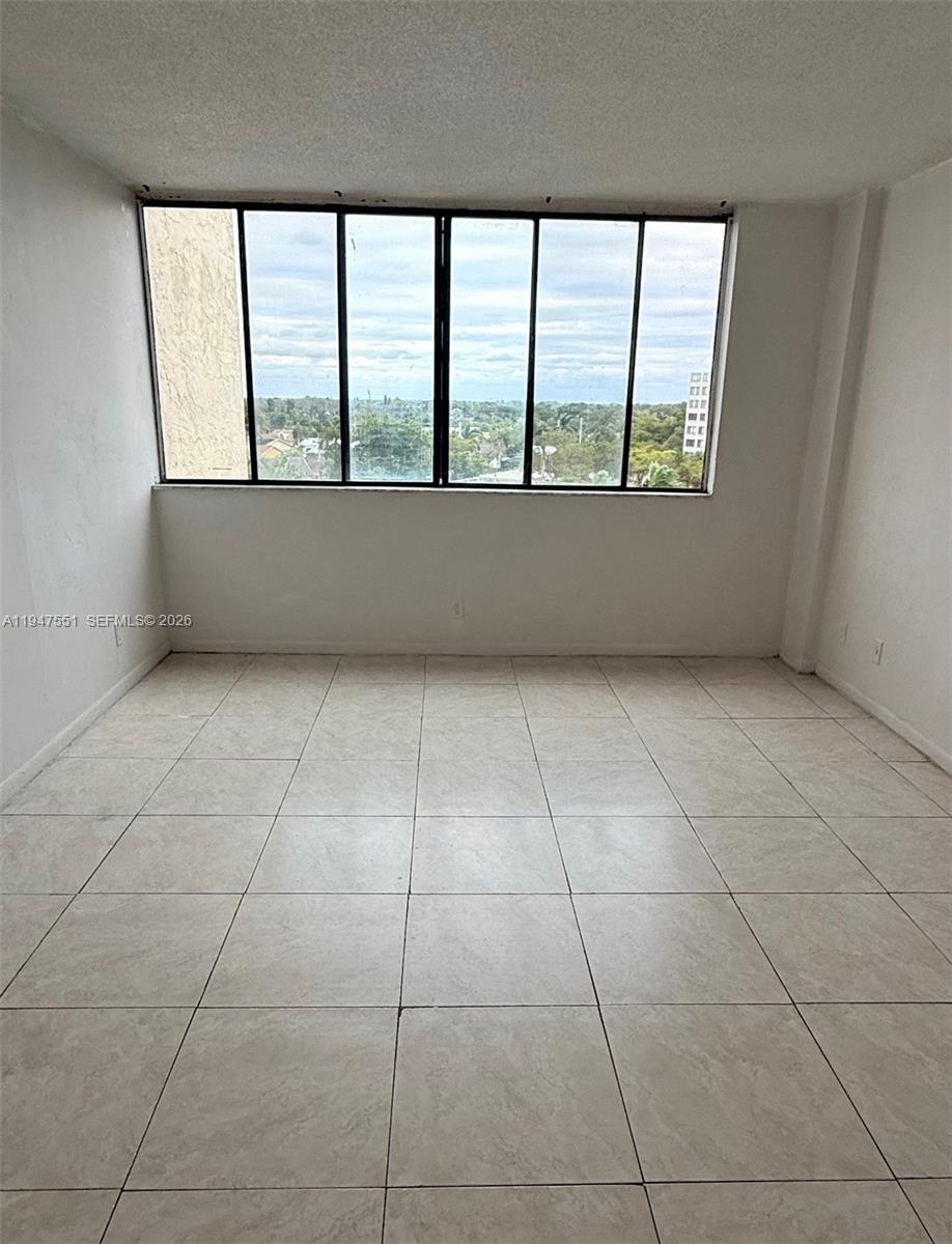 4200 Inverrary Boulevard, Unit 3604 Lauderhill, FL 33319 - Photo 8 of 14 a view of an empty room with a window