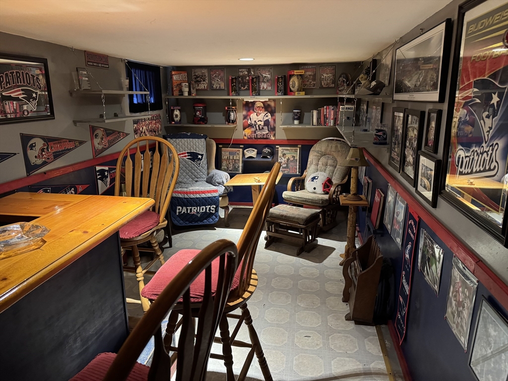 99 Leland Road Norfolk, MA 02056 - Photo 4 of 16 a view of a room with gym equipment