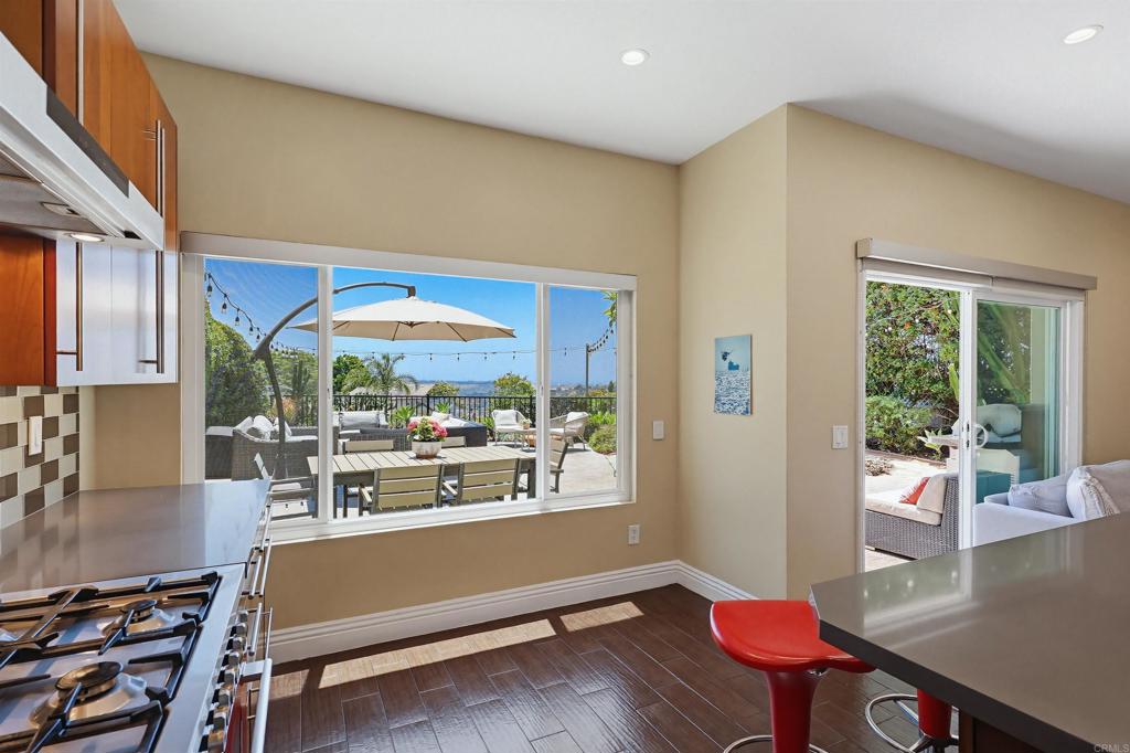 2756 Southampton Road Carlsbad, CA 92010 - Photo 22 of 40 a room with furniture and a large window