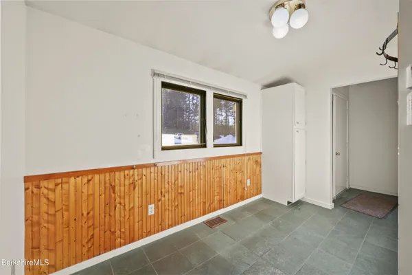 a view of an empty room and window