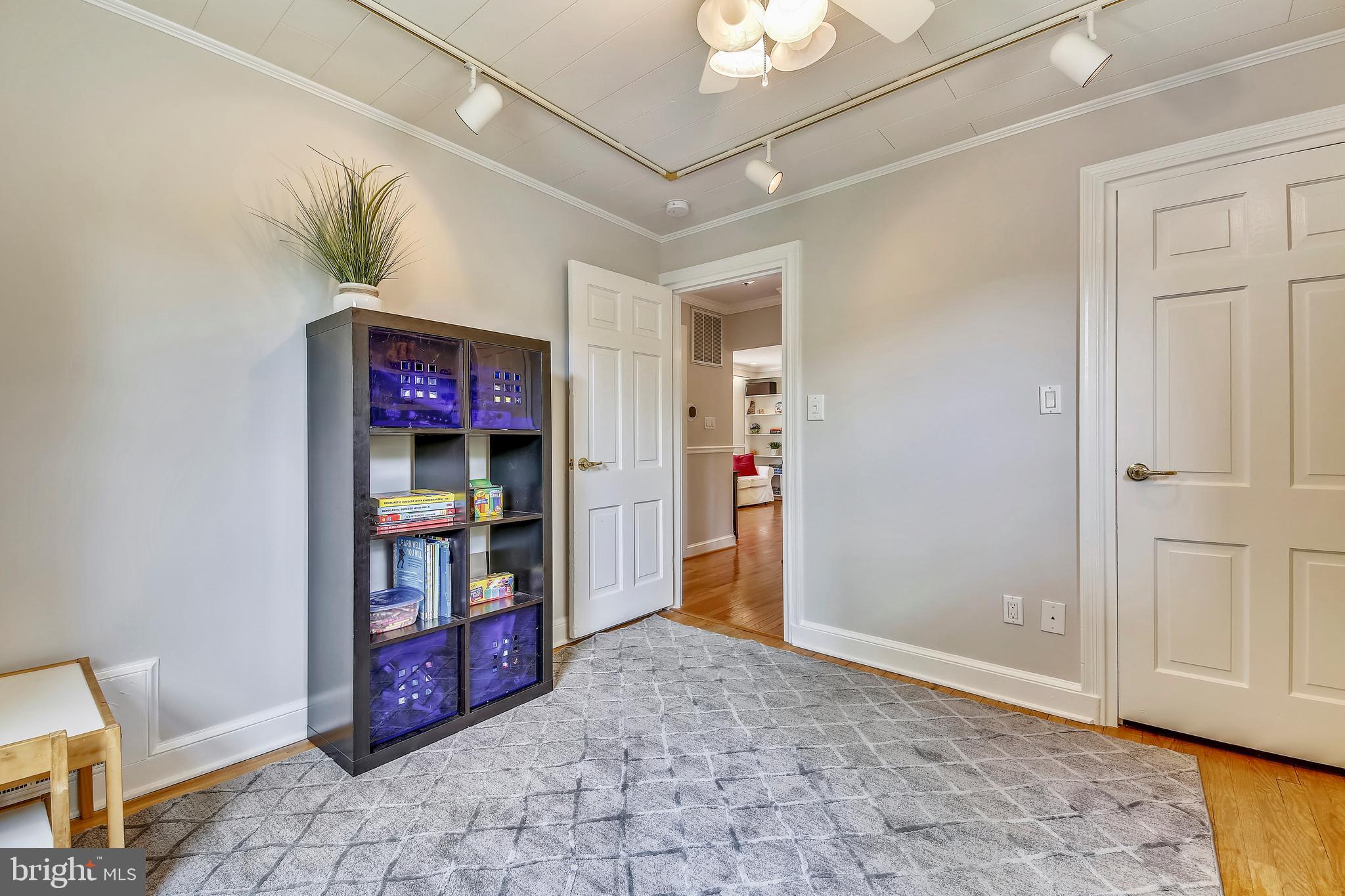 3210 Fayette Road Kensington, MD 20895 - Photo 16 of 39 Third Bedroom with Ceiling Fan and Track Lighting
