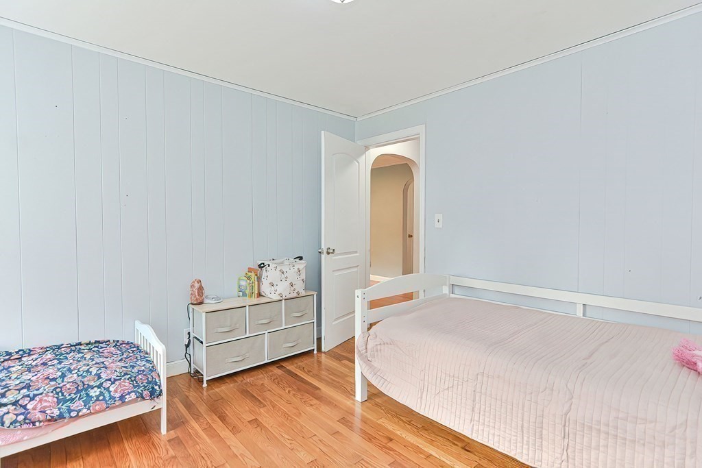 10 Rydal Street Worcester, MA 01602 - Photo 31 of 42 a bedroom with a bed and a cabinets