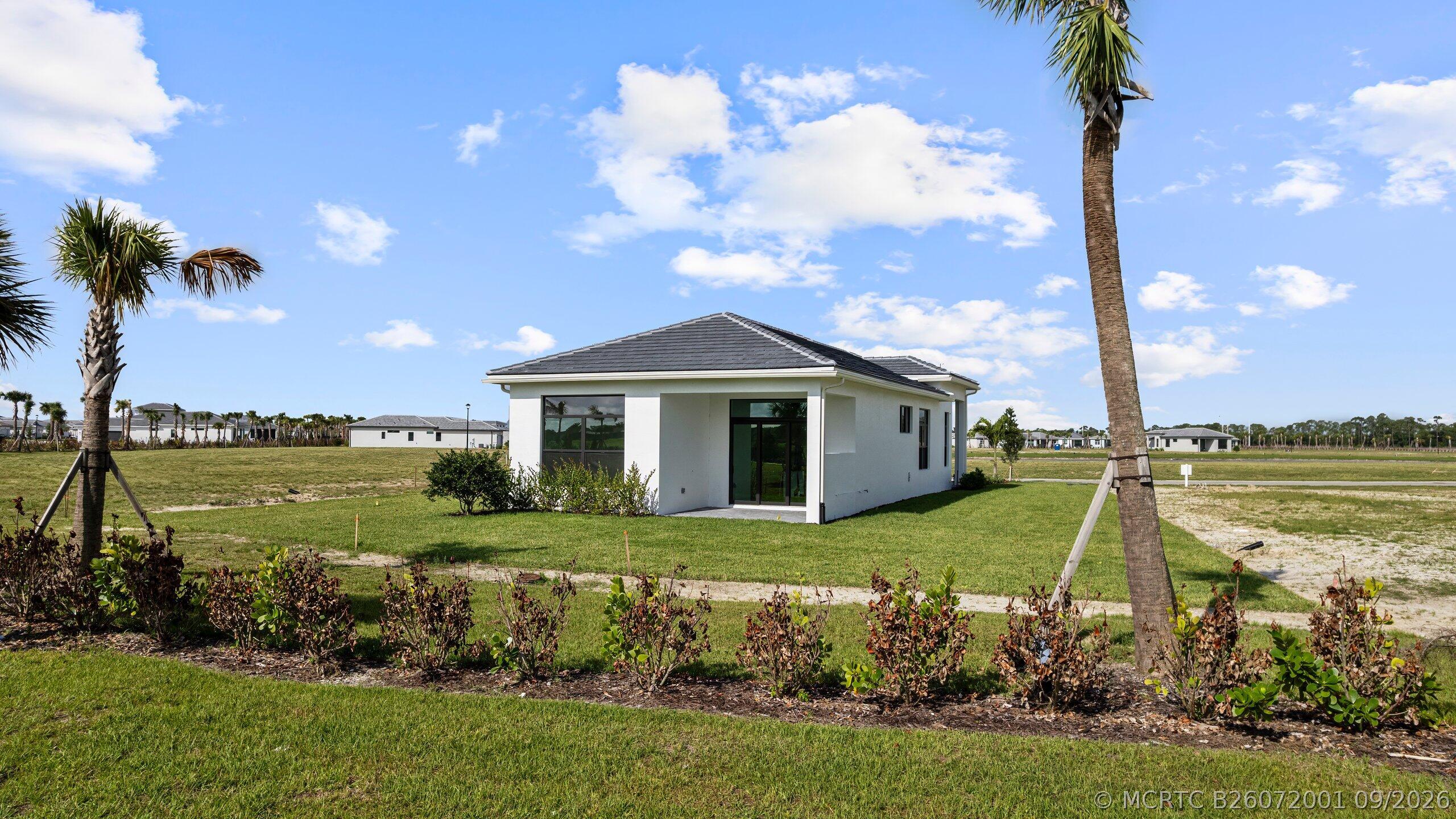 7999 Southwest Andrea Way Port St. Lucie, FL 34987 - Photo 35 of 64 Rear Exterior