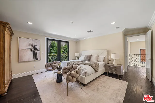 a bed room with a bed and a window