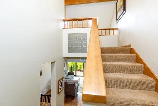 a view of entryway with furniture and a window