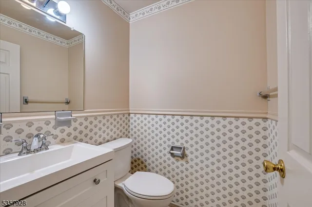 a spacious bedroom with a bed and a window