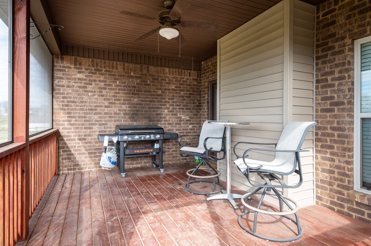 420 Bates Road Lebanon, TN 37087 - Photo 38 of 41 a view of a patio with table and chairs with wooden floor and fence