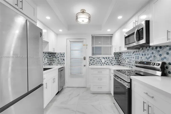 $220,000 | 11960 Northeast 19th Drive, Unit 15, North Miami, FL 33181