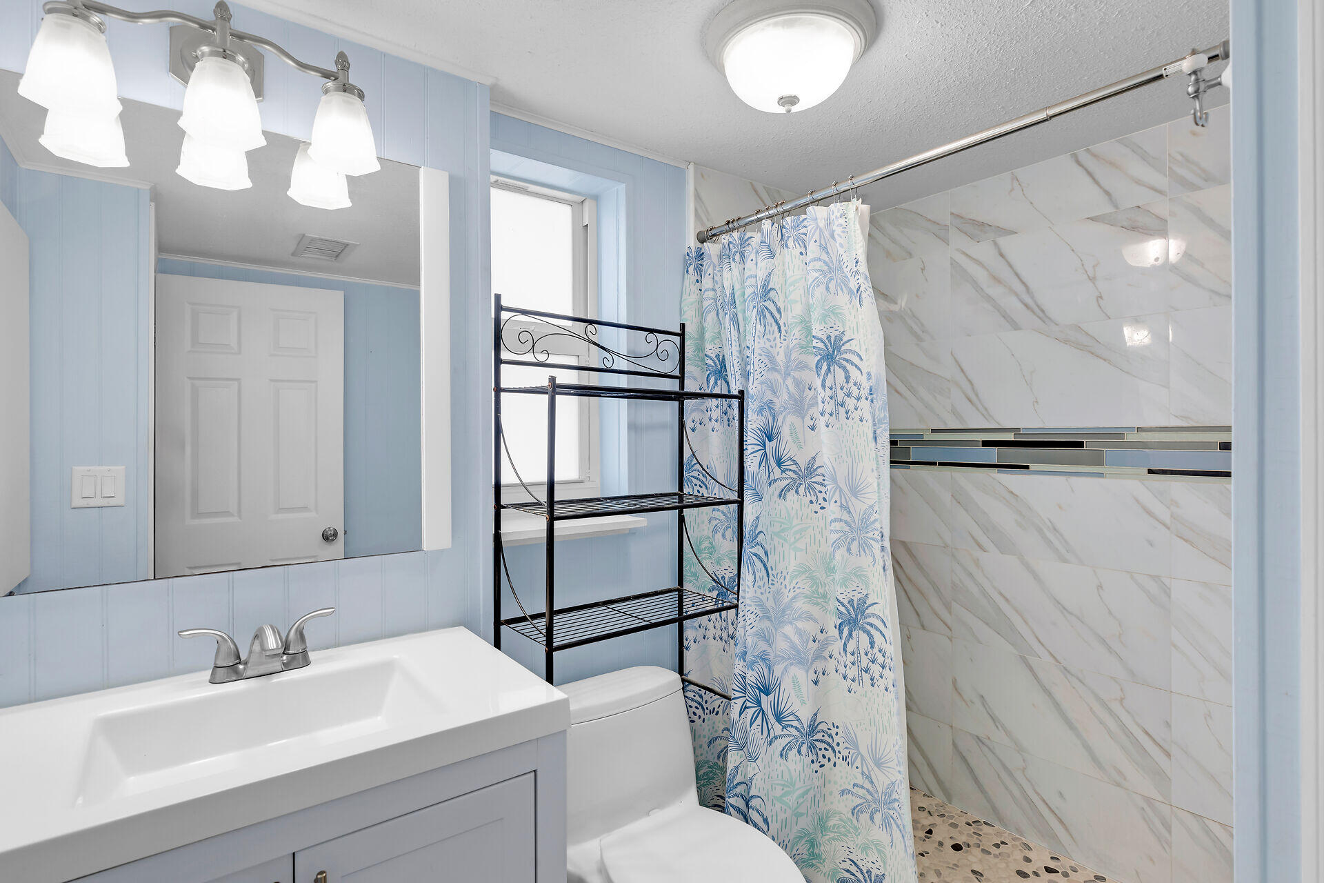 1215 97th Street, Unit 6 Marathon, FL 33050 - Photo 13 of 20 a bathroom with a sink toilet and shower