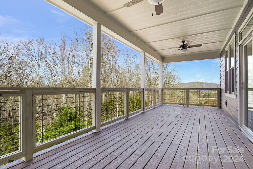 3 Craftsman Overlook Ridge Arden, NC 28704 - Photo 13 of 45 wooden floor in an empty room with a window