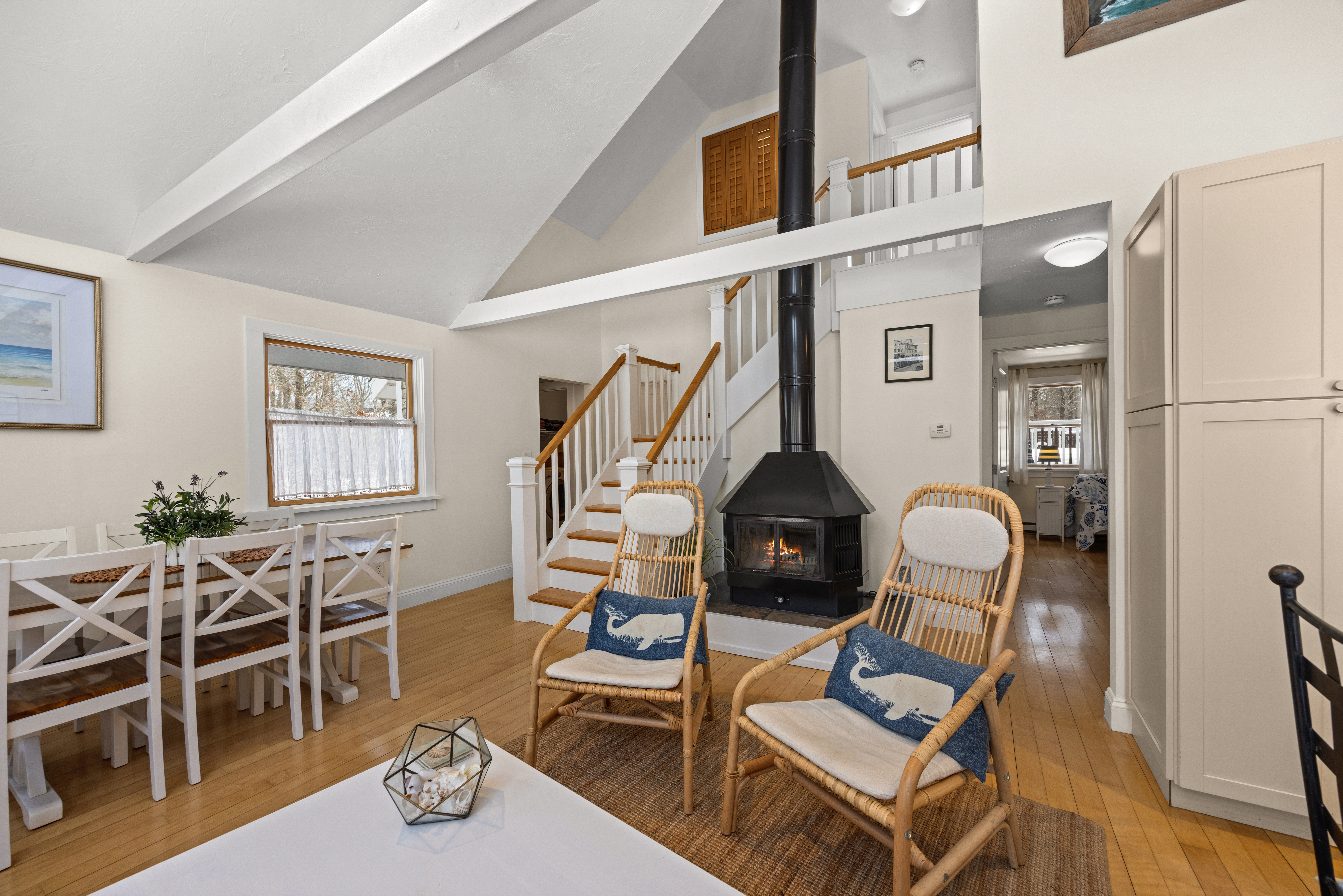 58 Rd To The Plaines Edgartown, MA 02539 - Photo 11 of 40 a living room with furniture a dining table and wooden floor